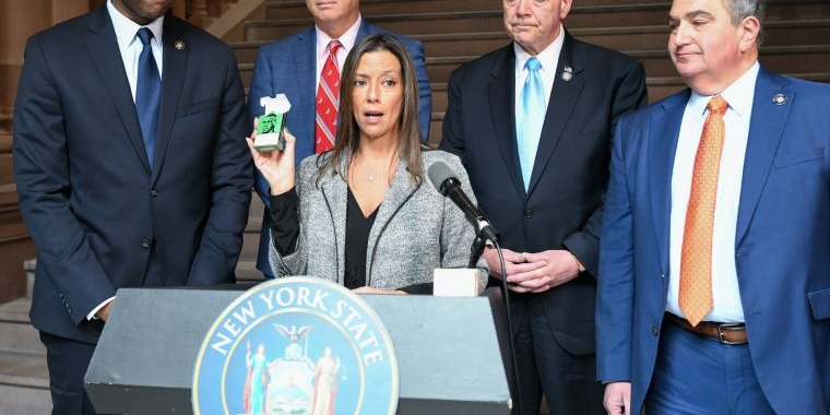 Senator Martinez Holds Up E-Cigarette Packing During Press Conference